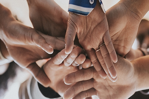Local Commitment - Hands